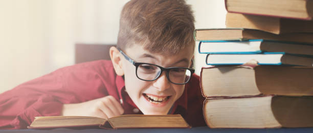 istock Children, happiness, reading and enjoying 841811396