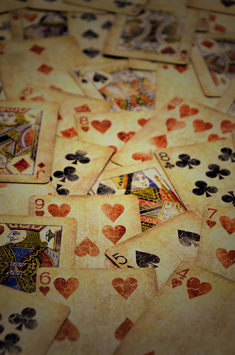 many old Poker cards close up photo