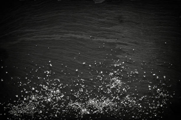 istock Image of sea salt on slate stone plate 841814312