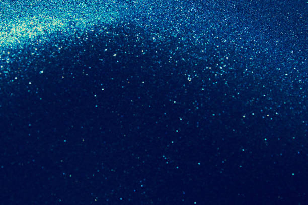 istock glitter vintage lights background. blue and black. de focused 841814348