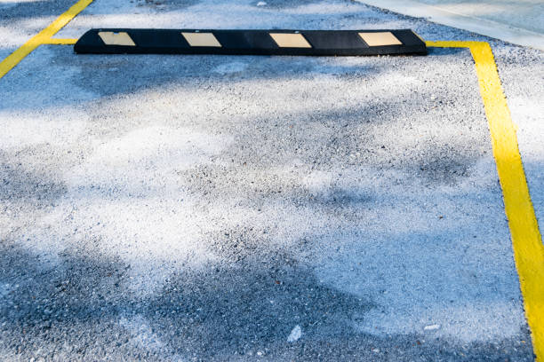 istock Empty Space in a Parking Lot / Empty space parking lot outdoor in public park. 841815478