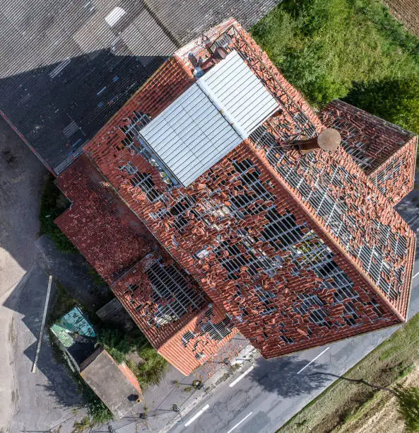 Photo of Ruin of an old house, destroyed roof, aerial photo, top view