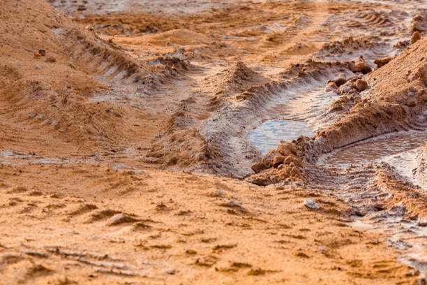 istock quarry with sand with tracks from tires 841825000