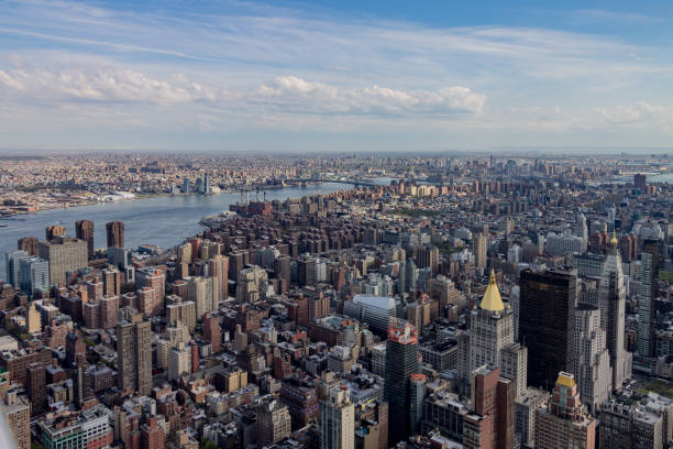 Cityscape of New York City Skyscrapers, Brooklyn and the Hudson River, Manhattan, New York City. new york life building stock pictures, royalty-free photos & images