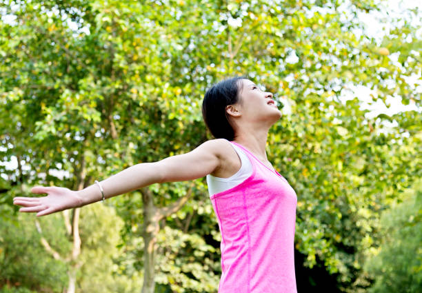 istock Young woman enjoying nature 841826332
