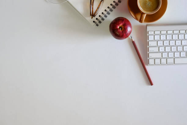 istock White office desk table with a lot of things on it. Top view with copy space. 841828962