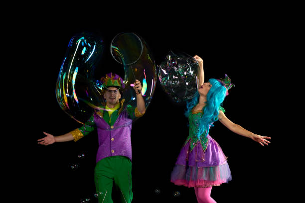 istock Artist team make amusement soap bubble. Soap bubble show in black studio. 841832016