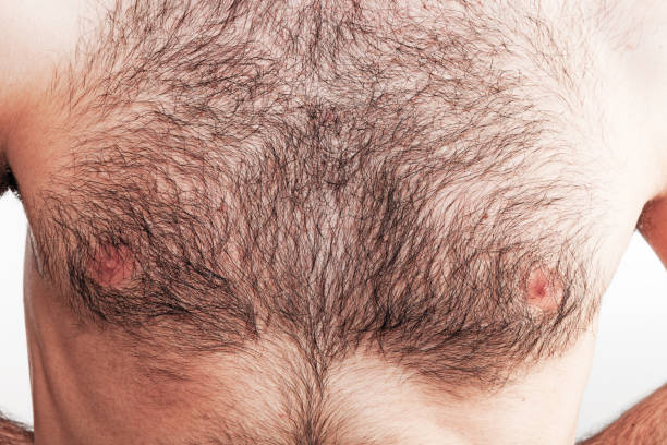 istock Boy with naked hairy chest on white background 841832426
