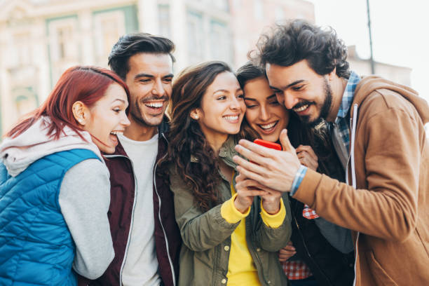istock Friends texting in the city 841836244