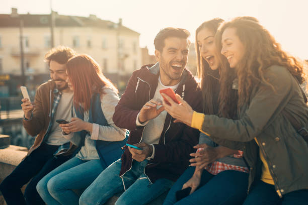 istock Friends texting in the city 841836254