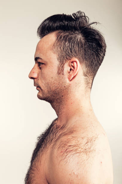 istock Boy with naked hairy chest on white background 841837148