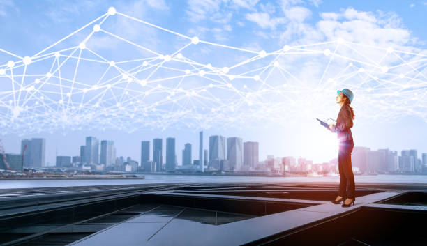istock construction industry and Internet of Things concept. modern buildings. woman engineer. communication network. industry4.0 841844160