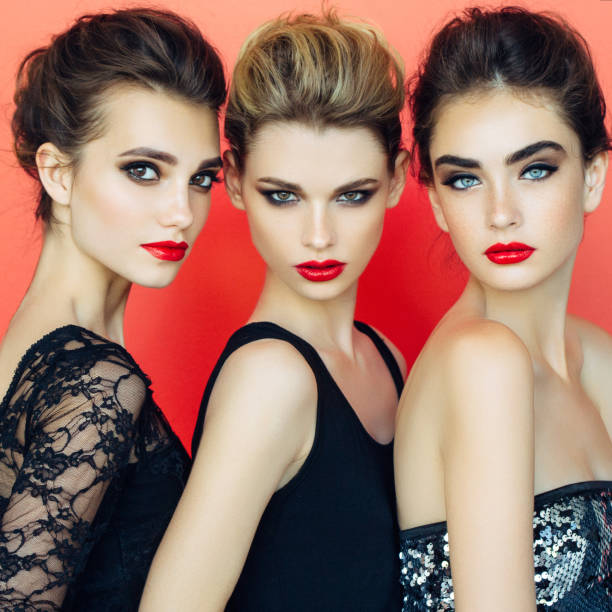 istock Three beautiful girls with make-up 841844454