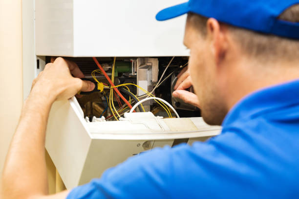 istock maintenance service engineer working with home gas heating boiler 841847260