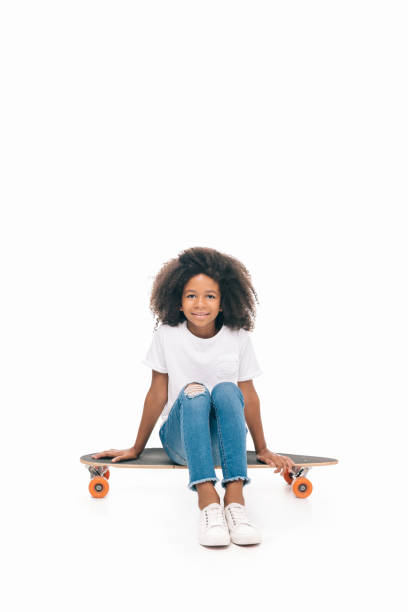istock african american girl with skateboard 841848734