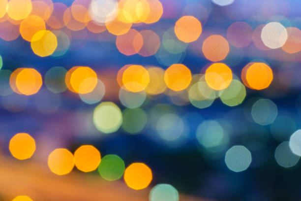 istock Defocused lights abstract colorful nonagon bokeh background 841852370