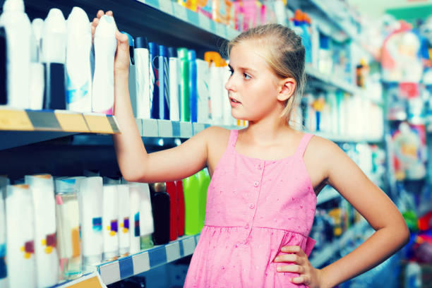 istock Girl is choosing deodorant 841854828