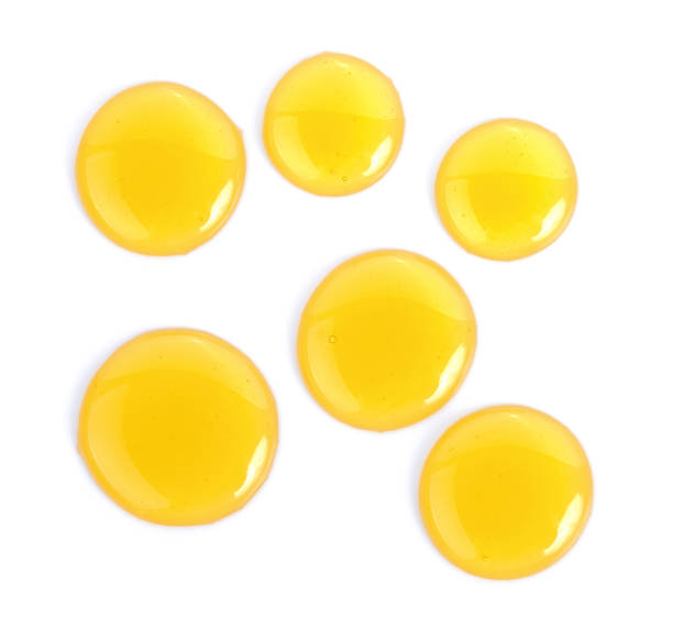 istock Sweet honey isolated on white background 841859520