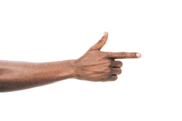 person pointing away with finger cropped shot of african american person pointing away with finger isolated on white index finger stock pictures, royalty-free photos & images