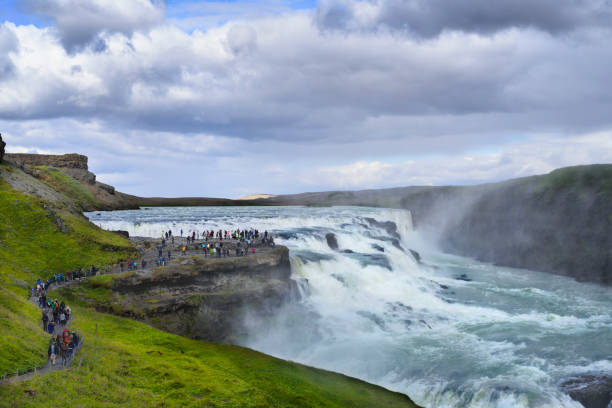 Gulfoss waterfall, Iceland, Golden Circle Landmark Thingvellir, Golden Circle Route, Iceland, Europe, Travel, large group of very small people visible golden circle route photos stock pictures, royalty-free photos & images