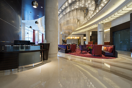 Luxury lobby interior.With crystal lamp,bing hall, marble floor, french sash,mosaic tile,comfortable sofa, etc.