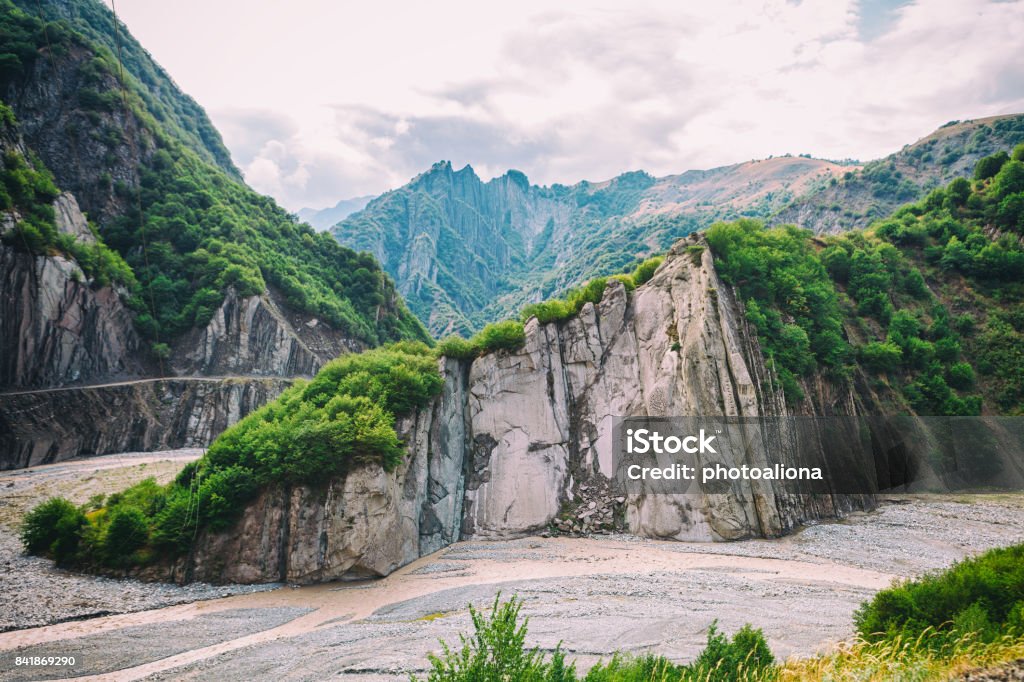 View of mountains Babadag and a muddy river Girdimanchay Lahij yolu from the side in Lahic village, Azerbaijan View of mountains Babadag, road and a muddy river Girdimanchay Lahij yolu from the side in Lahic village, Azerbaijan Ancient Stock Photo