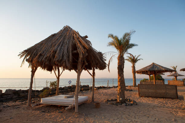 istock Sun over Hotel beach and sea 841883494