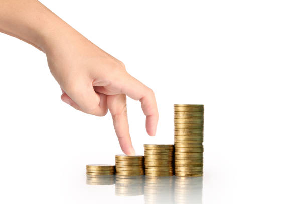 istock money growing from coins in hand 841883920