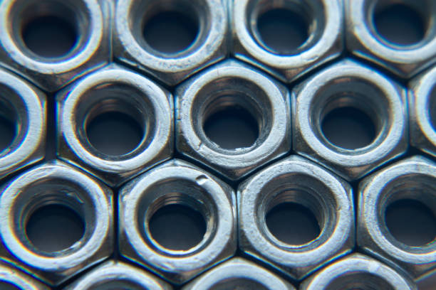 Metric nuts self-locking close-up. Metric nuts self-locking close-up. flange stock pictures, royalty-free photos & images