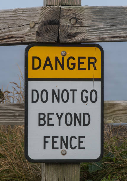 istock Danger Do Not Go Beyond Fence Sign 841890734