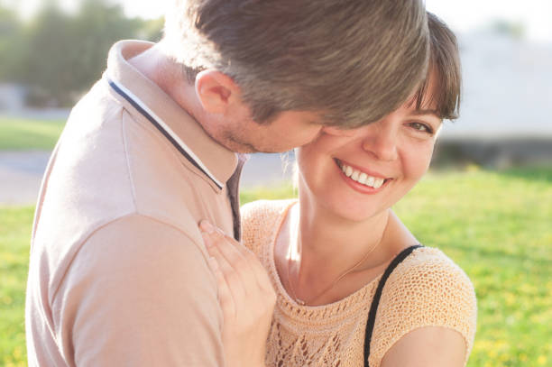 istock Happy smiling adult couple hugging 841899122