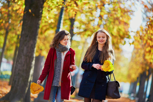 istock Two young girls on a sunny fall day 841899320