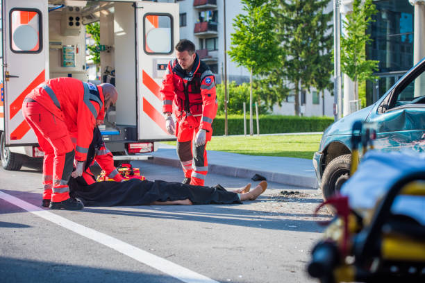 istock Paramedic covering dead body 841899578