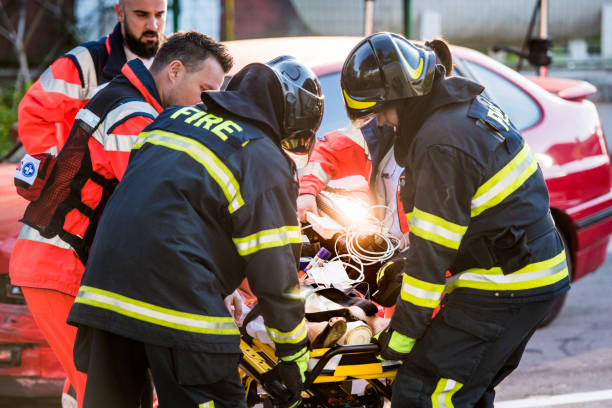 istock Rescue team helping injured woman 841901320