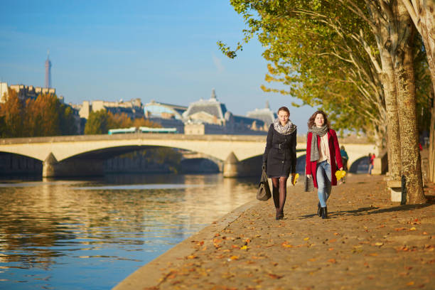 istock Two young girls walking together in Paris 841905144