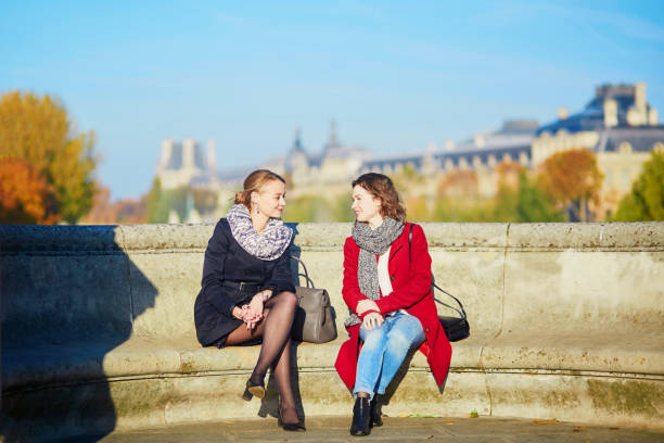 istock Two young girls walking together in Paris 841905302