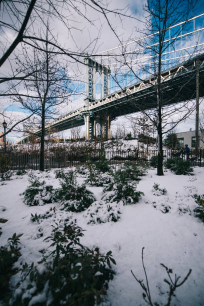 istock Manhattan bridge during the winter and the park 841912560