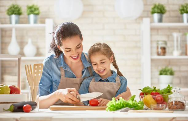 istock Happy family in the kitchen. 841913172