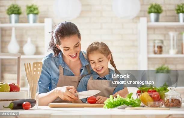 Happy Family In The Kitchen Stock Photo - Download Image Now - Mother, Cooking, Family