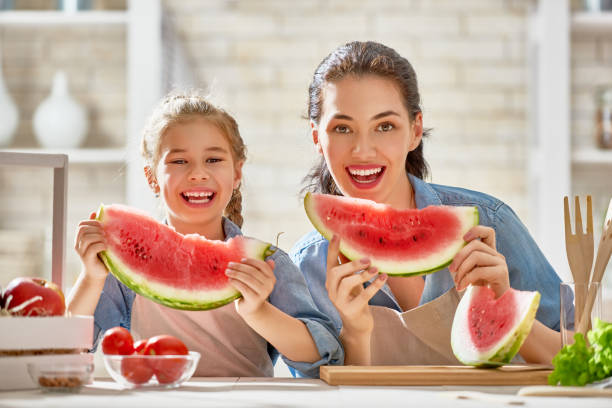 istock Happy family in the kitchen. 841913204