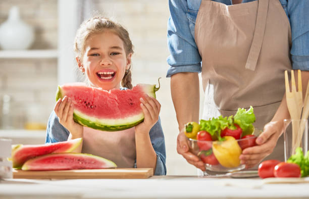 istock Happy family in the kitchen. 841913262