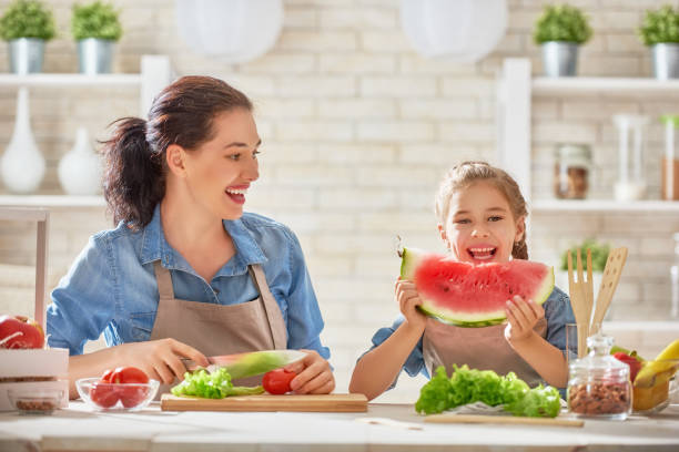 istock Happy family in the kitchen. 841913276