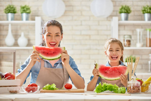 istock Happy family in the kitchen. 841913316