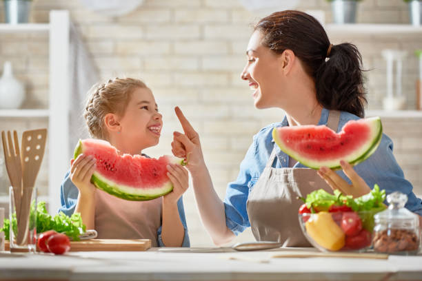 istock Happy family in the kitchen. 841913368