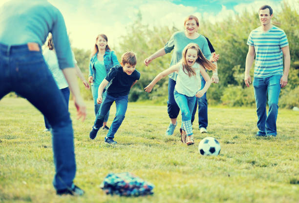 istock Friendly and glad family scoring goals 841913756