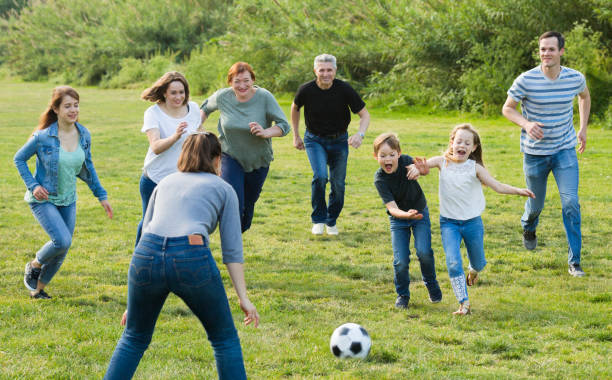 istock people of different ages playing football 841913764