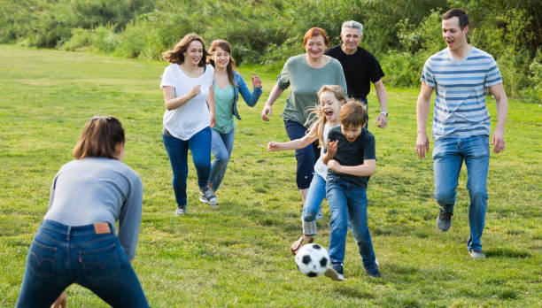 istock people of different ages playing football 841913796