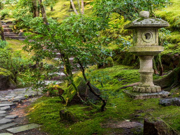 istock Lantern with Moss Green Plants Japanese Garden Oregon “CreativeContentBrief” 700060701 841923940