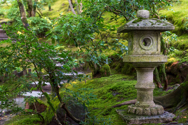 istock Lantern with Green Plants Moss Japanese Garden Oregon “CreativeContentBrief” 700060701 841924394