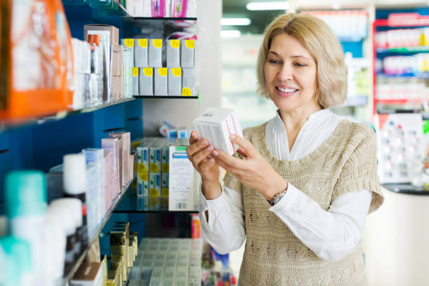 istock Female near counter in pharmacy 841928152